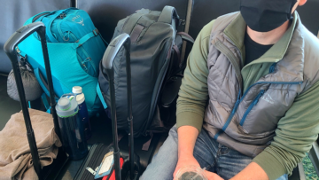 prevention - Jason guarding our bags in the airport