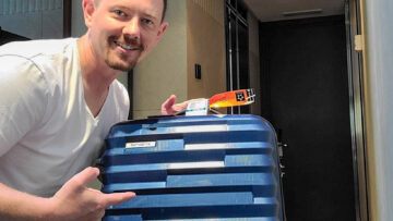 Jason with his lost luggage that finally arrived at his hotel