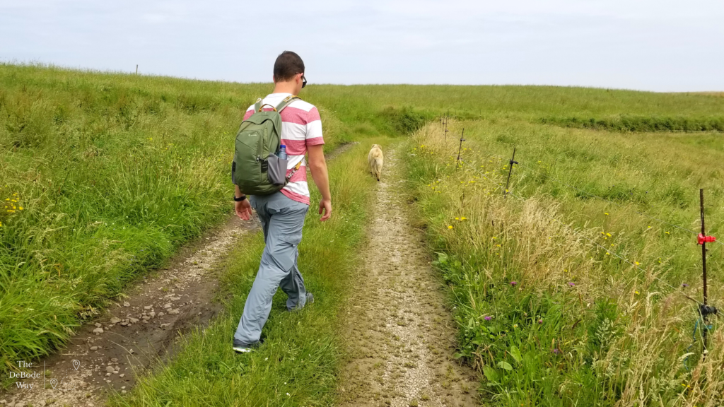 Jason hiking in a field in Asturias, Spain