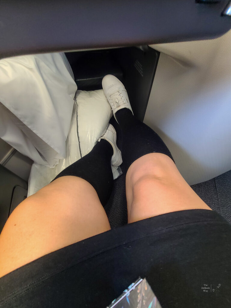 Tasha with compression socks in business class