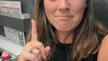 Tasha is sitting in her upgraded business class on United Airlines' partner Air Canada