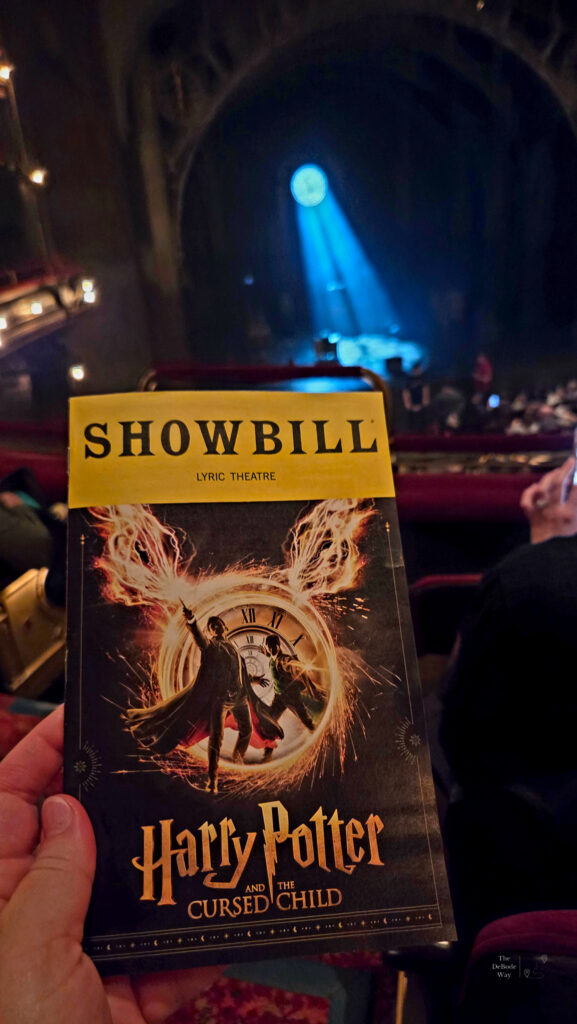 Showbill for Harry Potter and the Cursed Child with Lyric Theatre stage in the background in New York City