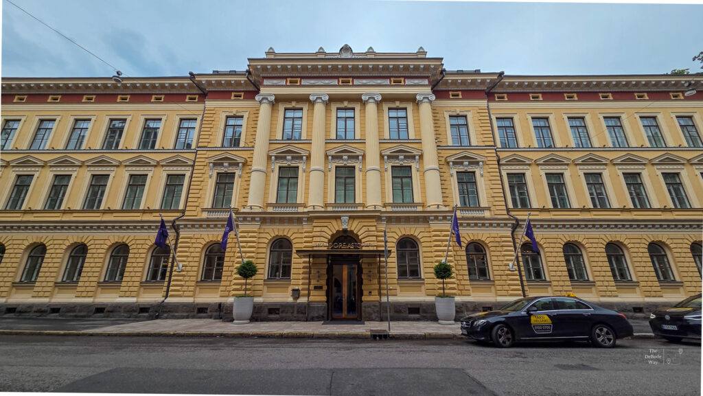 The yellow front facade of the Waldorf Astoria Helsinki